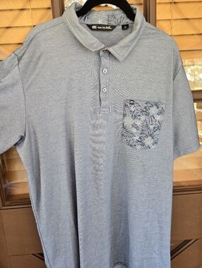 Travis Mathew "No Maps" golf shirt, heather blue floral chest pocket. Size XL